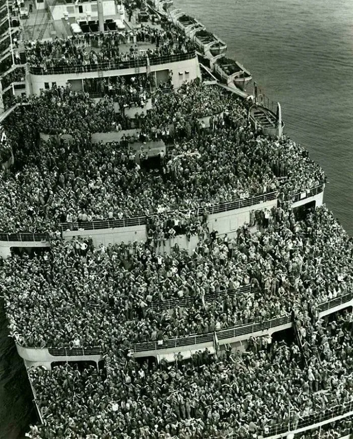 The Ship "Queen Elizabeth" Arrives At The Port Of New York. On Board Are Soldiers Returning From World War II, 1945
