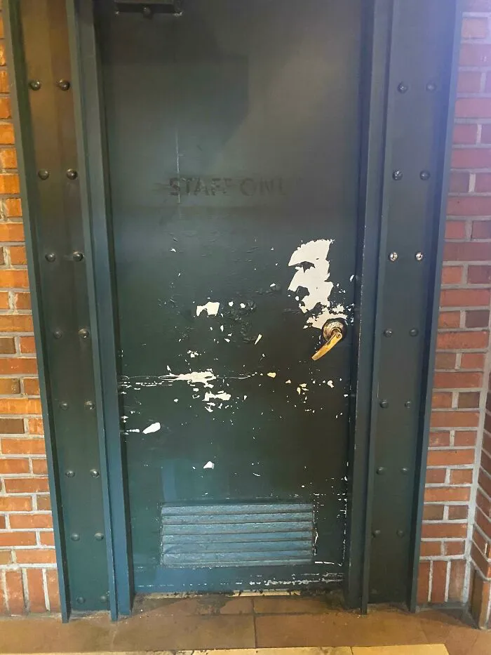 The Peeling On This Staff Entry Door Looks Like Edgar Allen Poe