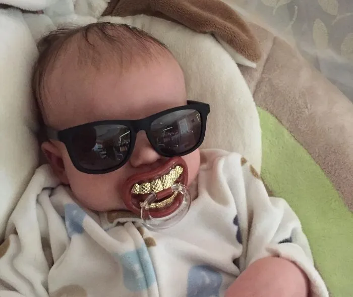 No Teeth Yet? No Worries, <span Style="Font:inherit;color:#d74b1f;"> Grillz Pacifier's</Span> Got Your Baby's Bling Sorted. Thug Life Starts Early
