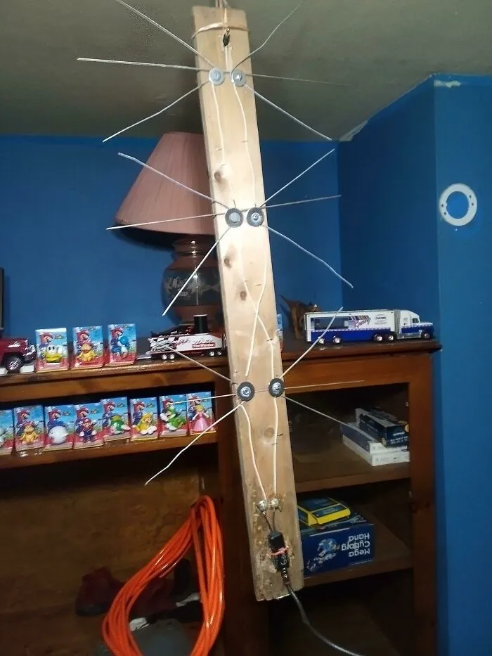 My Dad's Makeshift Antenna He Made Out Of Clothes Hangers And It Works Btw