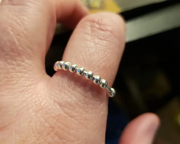 Spin Stress Away: <span Style="Font:inherit;color:#d74b1f;"> Sterling Silver Anxiety Ring</Span> To Save Your Fingers From Fidgeting