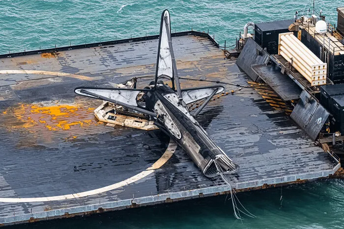 Spacex Falcon 9 Booster Tipped Over In Rough Seas While Being Transported Back To Shore