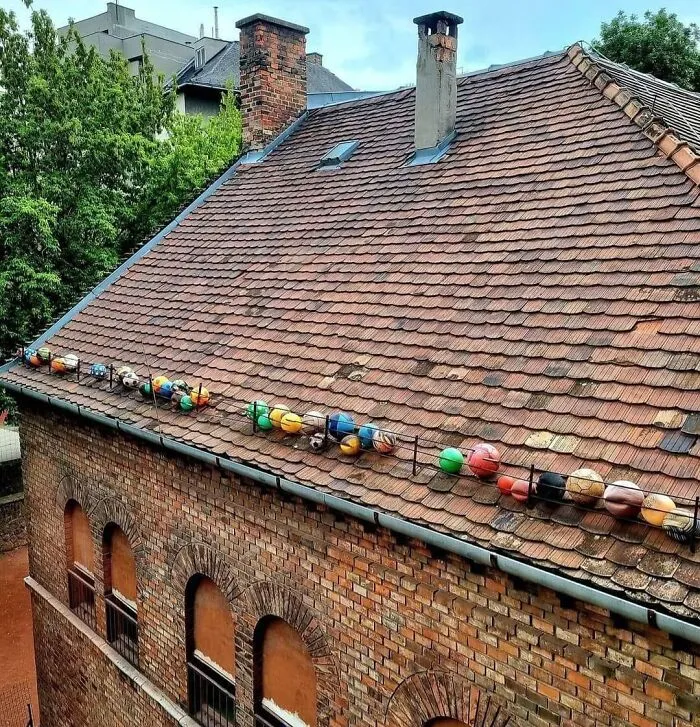 Rooftop Next To A Schoolyard
