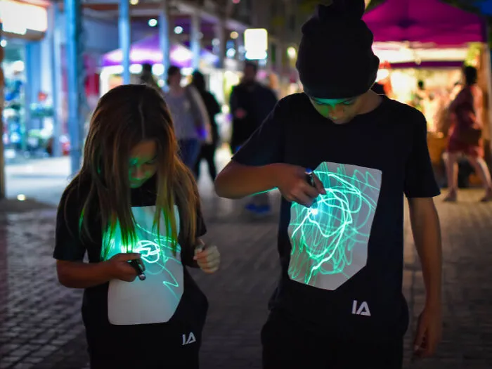 Glow On, Stand Out: <a Style="Display:inline;" Href="Https://Www.amazon.com/Interactive-T-Shirt-Illuminated-Apparel-Festival/Dp/B01lf4vk3k?th=1&psc=1&linkcode=ll1&tag=bporca-20&linkid=ce89b6238d168c3abc063e3c23e32a57&language=en_us&ref_=as_li_ss_tl" Target="_blank"><span Style="Font:inherit;color:#d74b1f;"> Interactive T-Shirt</Span> For Unforgettable Party Vibes!