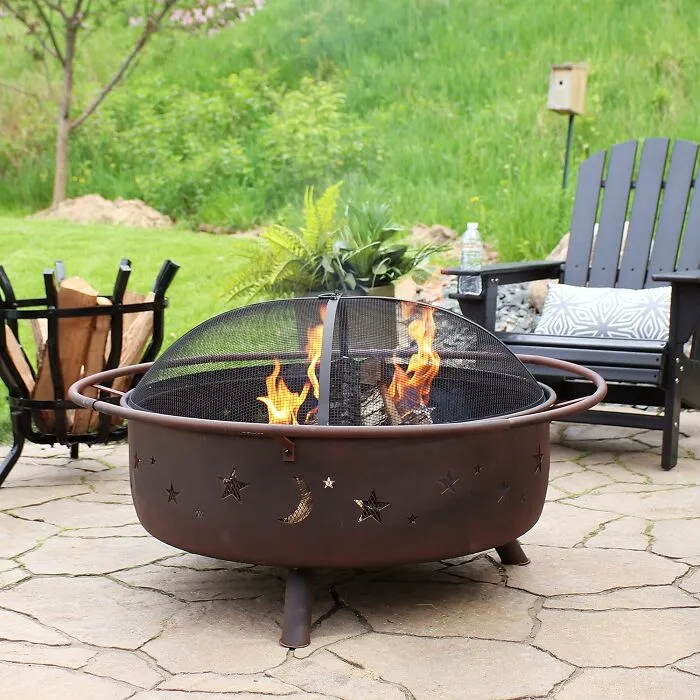 Ignite Your Evenings With <span Style="Font:inherit;color:#d74b1f;"> The Steel Fire Pit</Span>: Your Backyard's Focal Point For Warmth And Ambiance