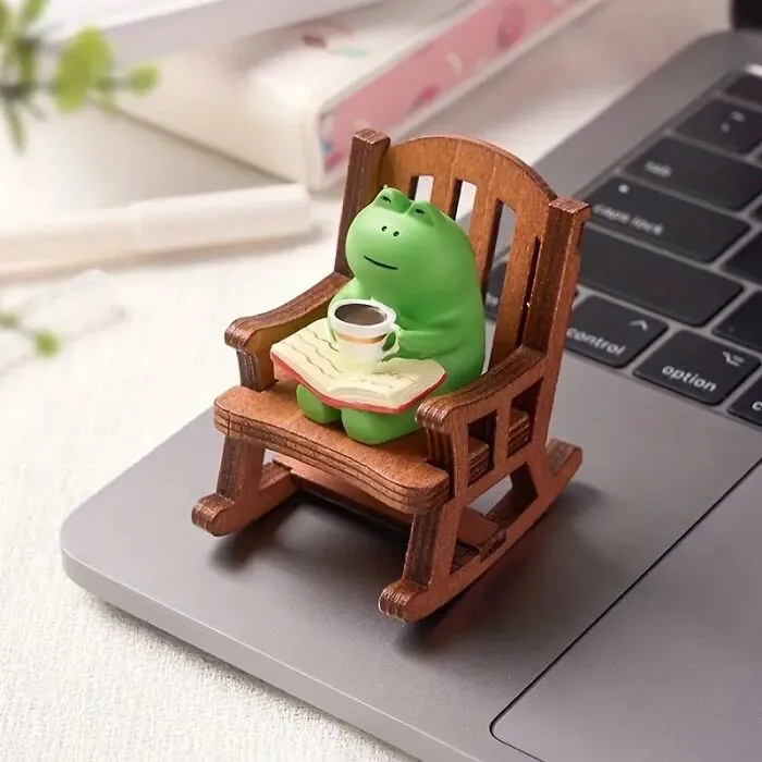 Add A Hop Of Fun To Any Space With This <span Style="Font:inherit;color:#d74b1f;"> Hand Painted Froggy In A Rocking Chair Decoration</Span>!