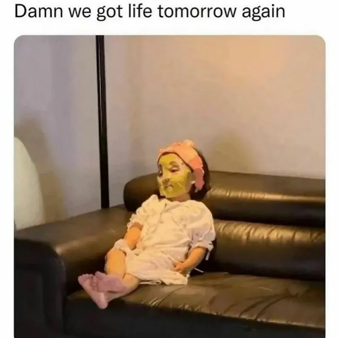 Person with face mask and towel headband sitting tired on a couch, illustrating winning introverts and relatable memes.