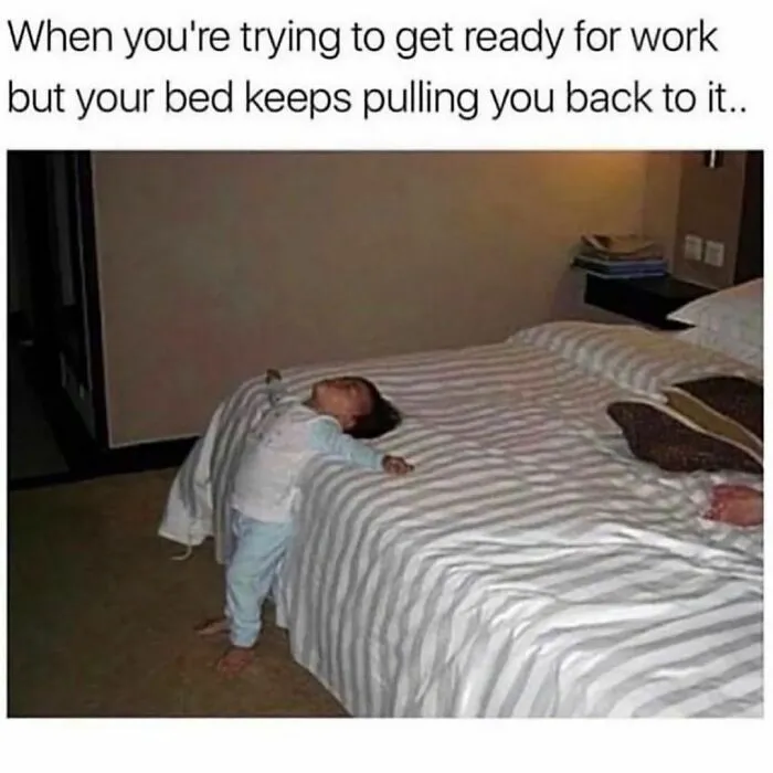 Child in pajamas leaning back on bed, illustrating relatable humor about introverts struggling to get ready for work.