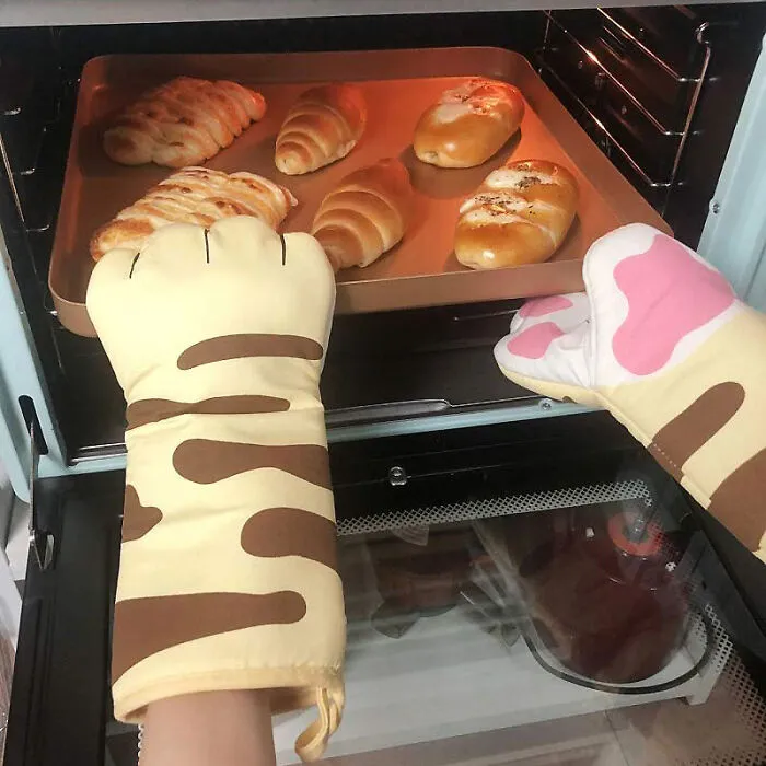 Handle The Cooking Heat With These Purr-Fect <a Style="Display:inline;" Href="Https://Www.amazon.com/Mitts-Kitchen-Cooking-Baking-Resistant/Dp/B08cl5w75q?crid=kij1l4hlra62&dib=eyj2ijoimsj9.rqptm0r7puzypasyxwvnm1fc4ggomuvcjkwtrke2gbwf-Vqcgpacdlfdxu8ftsqkstchf8nl0rzyorqv75bycscgk5oeyugvthniztbccxicp39of3slx38q7wsgflnlw-M5fe0lyh_ufgm4loxa5eh6chbnrpoejqscskwsh1zyzadoluw5hhx1nczzqhvri7ulb9ni5hcf-_dktbqc5aft2av9dr1qhznclhrohwa5hrlyhvwmykfwaqjrpoy-5xims6donbyfi0tcqpvp8gjgfq8cr_wuvqopvdejnoc.ipqegacyhskc6ob2nfpeechibrfqugh6twhnpov7_mm&dib_tag=se&keywords=weird%2bkitchen%2bitem&qid=1712734947&sprefix=weird%2bkitchen%2bitem%2caps%2c179&sr=8-8&th=1&linkcode=ll1&tag=bprabbit-20&linkid=7666d08139e735467cc15842f648f68b&language=en_us&ref_=as_li_ss_tl" Target="_blank"><span Style="Font:inherit;color:#d74b1f;"> Paw Oven Mitts</Span>