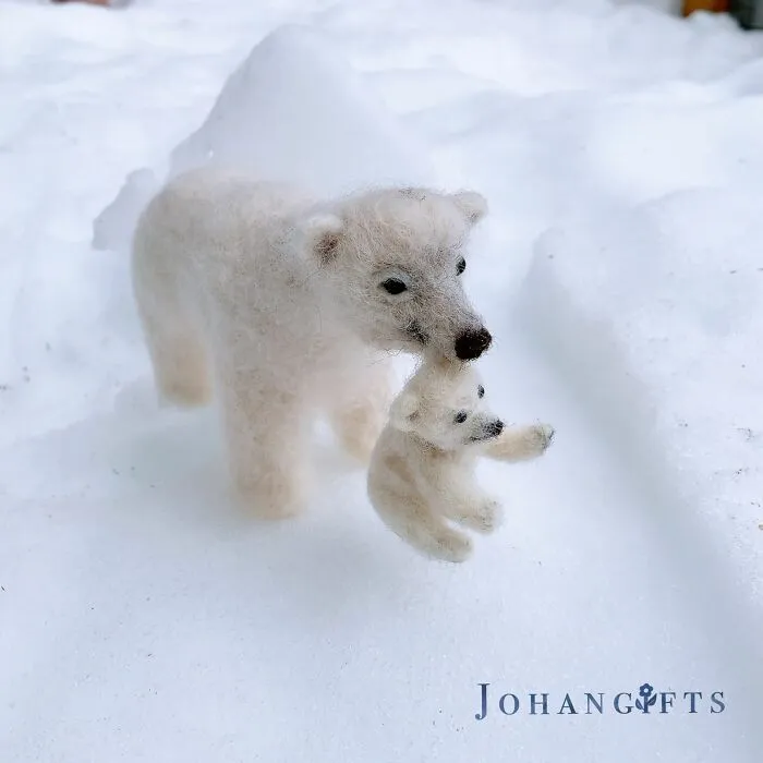 Polar Bear And Playful Cub