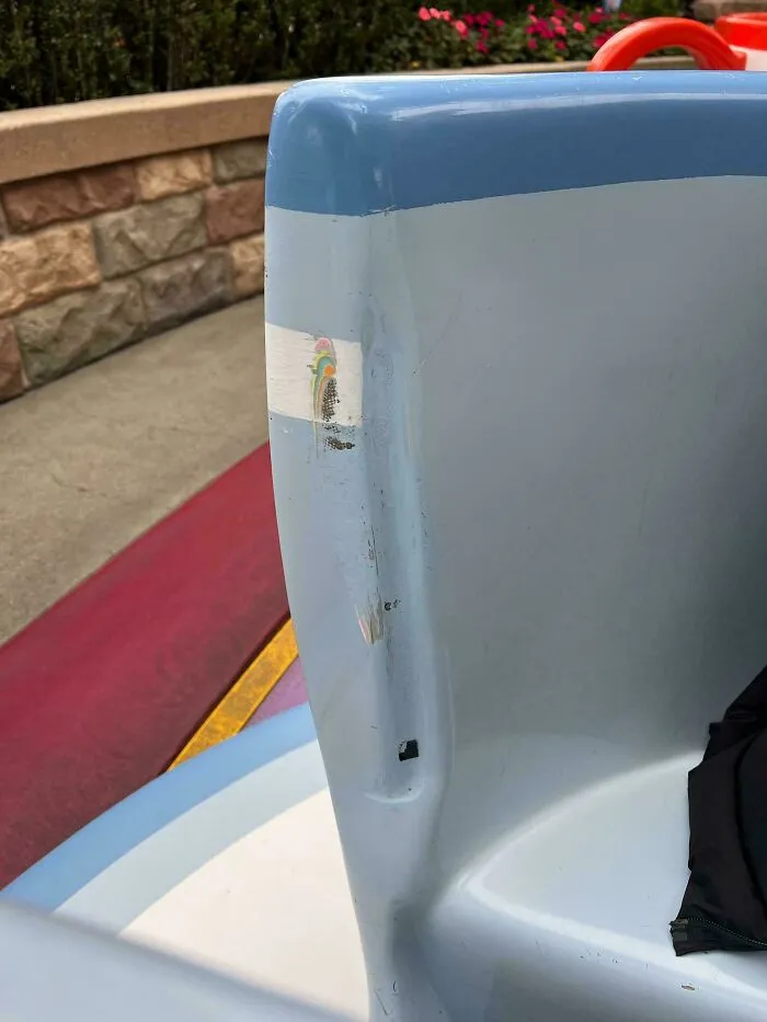 You Can See All The Colors Of The Disneyland Teacup Because Its Worn Off Where The Door Closes