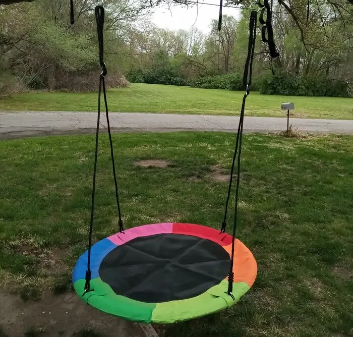 Add A Pop Of Color To Your Outdoor Area With This <span Style="Font:inherit;color:#d74b1f;"> Rainbow Disc Swing </Span>
