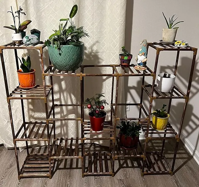 If You Always Need An Excuse To Buy More Plants, This <a Style="Display:inline;" Href="Https://Www.amazon.com/Bamworld-Stands-Outdoor-Multiple-Balcony/Dp/B09m2sfzhn?crid=1s9waybsynacs&dib=eyj2ijoimsj9.nyyfsyflhtivbk95b4pk-Nn4qarwrm02no2mmjjejox2sudsz87la_s6onm8eoarbw3gfhc794lfoqcq-Wazabiy8o27n1_syjhlrn_q5_zylsoft3uuzqsnwz4fi9g8hoykbzuaj4-Ilg9mnt-Mwykdqnkt-Vq1jwbiwqmujffksexny1sx7pgeeo5yhlycyntbj_arg0umeqkgvauwa_xejqj8ifaw2hmtf-1capuly8dkdsnltyh7wc0xi5loxyr2q416-AI8ln0yozczbdudyrpfjqbtpzpiy9nvsbk.djxfeyanvdpkclbbxmgvahhigto_d6ejucosvk7vmf4&dib_tag=se&keywords=plant%2bstand%2bindoor&qid=1716195725&s=home-Garden&sprefix=plant%2bstand%2bindoor%2cgarden%2c406&sr=1-5&th=1&linkcode=ll1&tag=bpfish-20&linkid=fe48d631b434c6aa48f66130a513c05c&language=en_us&ref_=as_li_ss_tl" Target="_blank"><span Style="Font:inherit;color:#d74b1f;"> Wooden Plant Rack </Span> Has Your Name On It