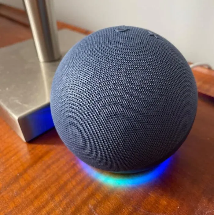 A dark blue spherical smart speaker glowing, a convenient last minute Father's Day gift for tech lovers.