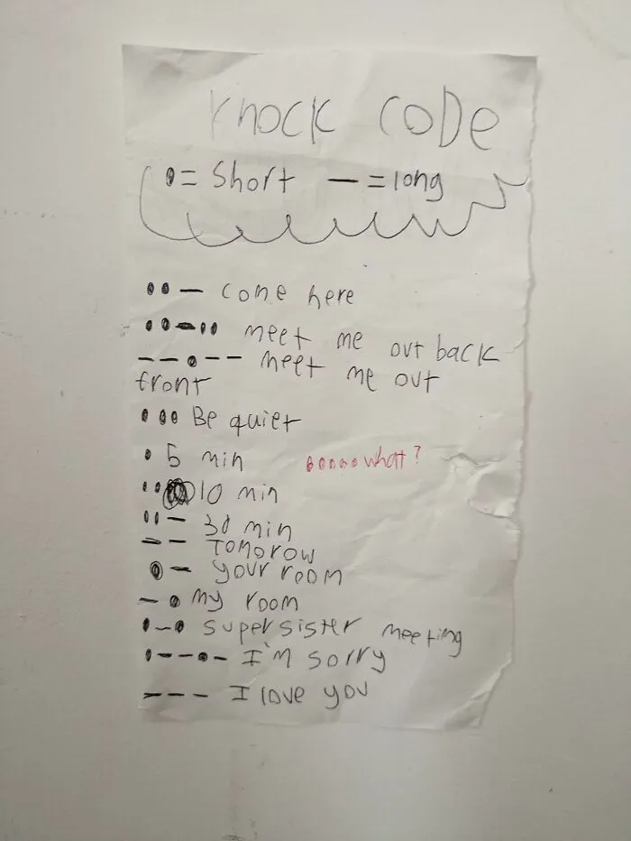 Handwritten knock code note with funny messages demonstrating wholesome dad communication and humor.