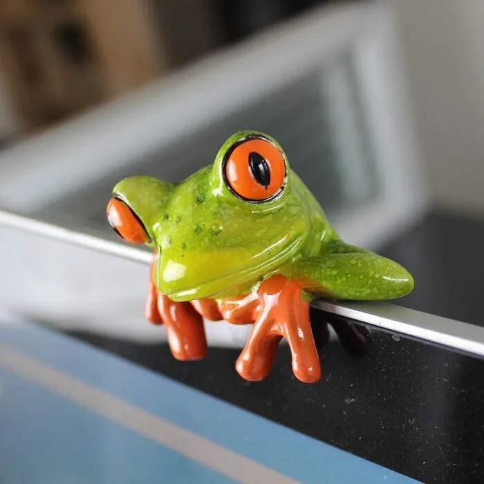 Your Monday Might Feel Like A Scene From "The Office" (The Awkward Parts, Mostly), But At Least Your Desk Can Gain A Tiny, Unblinking Colleague With This <a Style="Display:inline;" Href="Https://Www.amazon.com/Gp/Product/B07rj2xc95?&linkcode=ll1&tag=bpsheep-20&linkid=79f8443c5b586127d020be2bbeaa7323&language=en_us&ref_=as_li_ss_tl" Target="_blank"><span Style="Font: Inherit; Color: #d74b1f;"> Resin Desktop Frog </Span>, Who Will Definitely Not Steal Your Stapler