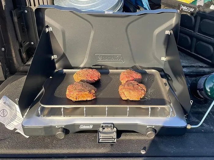 Your Camping Crew Will Think You're A Culinary Wizard With This <a Style="Display:inline;" Href="Https://Www.amazon.com/Coleman-Triton-2-Burner-Propane-Camping/Dp/B09hn1c1yj?ie=utf8&linkcode=ll1&tag=bpraccoon-20&linkid=44ac433fb6a45338f3fc2005e5c0a95a&language=en_us&ref_=as_li_ss_tl" Target="_blank"><span Style="Font: Inherit; Color: #d74b1f;"> Coleman Triton Stove</Span> By Your Side