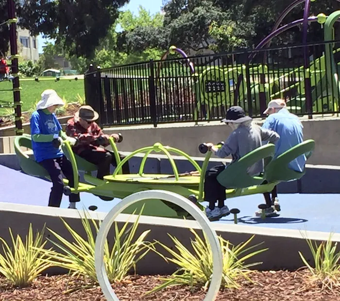 Seniors Enjoying The New Playground