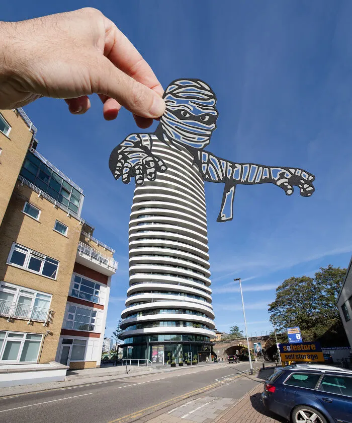 Artist Creates New Stories By Adding Cutouts To Various Landmarks (34 New Pics)