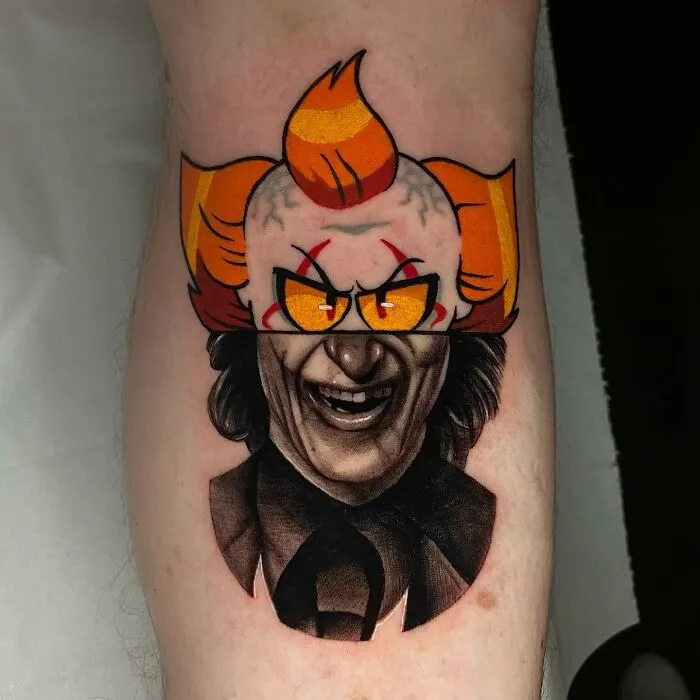 Tattoo featuring two artistic styles, blending a colorful clown and a grayscale portrait seamlessly.