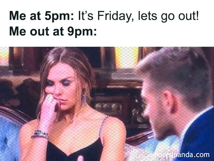 Two people sitting on a couch, with text humorously comparing excitement at 5pm to exhaustion at 9pm. Happy Friday meme.