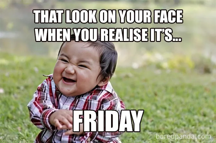 Happy Friday meme with a laughing baby in a plaid shirt, sitting on grass, enjoying the start of the weekend.