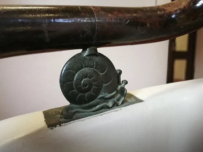 The Stair Handrails In My Uni's Biology Building Are Held Up By Little Snails