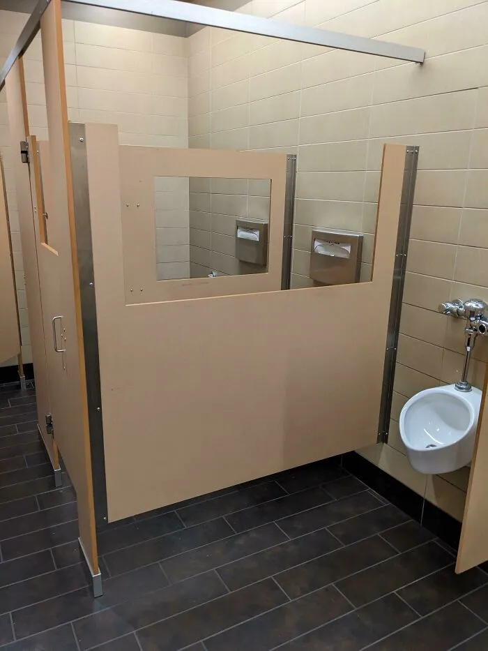 Public Restroom Stalls With... Viewing Windows? Why?