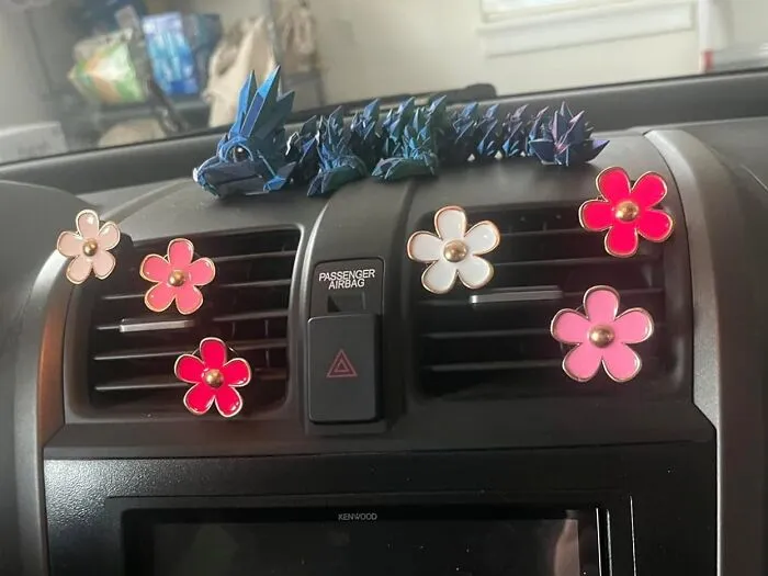 This <a Style="Display:inline;" Href="Https://Www.amazon.com/Decoration-Conditioning-Freshener-Interior-Accessories/Dp/B098wl9v6n?ie=utf8&th=1&linkcode=ll1&tag=bpbutterfly-20&linkid=c10e6a5b41e30a2abd5d1b70c393d58f&language=en_us&ref_=as_li_ss_tl" Target="_blank"><span Style="Font: Inherit; Color: #d74b1f;"> Flower Air Vent Clip</Span>  Will Make Your Car Smell Like A Spring Meadow (Minus The Pollen)