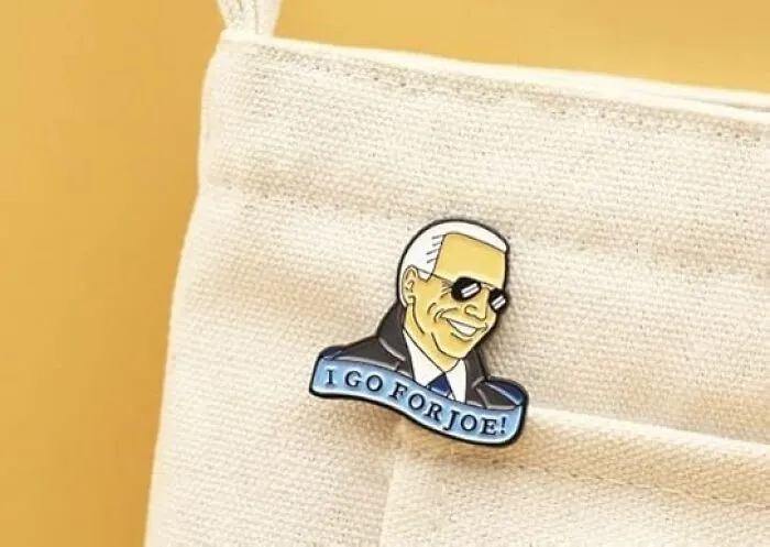 Not All Political Accessories Need To Be As Obvious As A Maga Hat. This <a Style="Display:inline;" Href="Https://Www.amazon.com/Forjoe-Cartoon-President-Personality-Backpack/Dp/B0bznpqwml?ie=utf8&linkcode=ll1&tag=bpkiwi-20&linkid=3a080b782110dea7626e65c9e7869dad&language=en_us&ref_=as_li_ss_tl" Target="_blank"><span Style="Font:inherit;color:#d74b1f;"> Joe Biden Enamel Pin</Span> Is Just Understated Enough