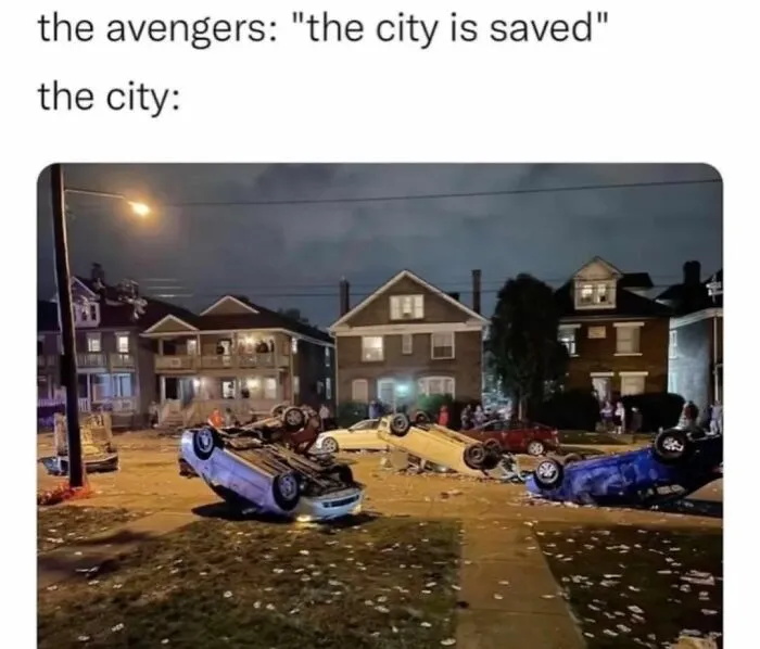 Funny meme showing overturned cars in a neighborhood, with text about the Avengers saving the city.