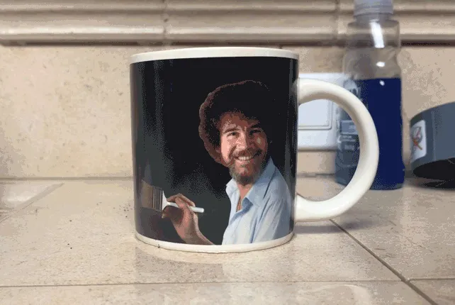 This <a Style="Display:inline;" Href="Https://Www.amazon.com/Unemployed-Philosophers-Guild-Ross-Self-Painting/Dp/B071g3ll38?th=1&linkcode=ll1&tag=bppeacock-20&linkid=357393e4b20182de8b2091cf5e516db0&language=en_us&ref_=as_li_ss_tl" Target="_blank"><span Style="Font: Inherit; Color: #d74b1f;"> Bob Ross Heat Changing Mug </Span> Will Bring Out Your Inner Painter, Even If Your Artistic Talent Peaks At Stick Figures