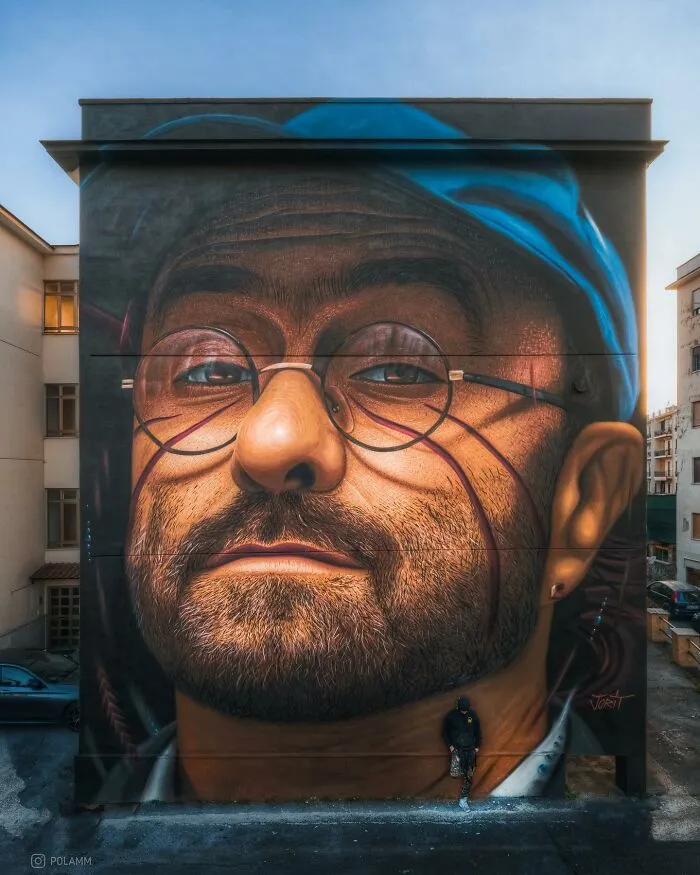 “Save The Human Tribe”: 32 Of Jorit Agoch’s Large-Scale Murals Of Famous And Everyday People