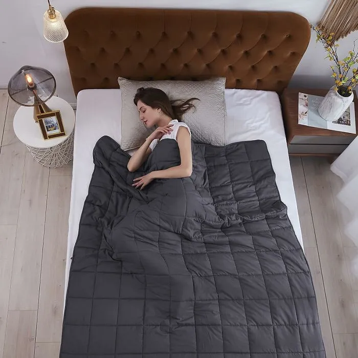 This <a Style="Display:inline;" Href="Https://Www.amazon.com/Weighted-Breathable-Microfiber-Material-All-Season/Dp/B097dk6zcr?crid=2b4xh1wl5pkc1&dib=eyj2ijoimsj9.dwnbgutklyet0jnmw39tokivponi6njglnv9vf8posonl_txwtbsum5ybohrtbducughupgz0mvalu5j-Azz6-Smwy668_uvf1fmq_8twm3mnqi3uslymwwuwti3my1pes-Vuoxcabhnzyhygzyyi8q1ubydqc4uhwtisy_4wx9ylysiv_zisolrc8rqviqdlooy_izm2hf09vo1nmlydreczq7ou7fxvij_ym-Dwf06z-Syto1vnjekh410-Bxnph4dkelpmhuh2qgh-6z2wd8qtenkv22mh3gf449rdkk.-Jzdv1qxbx8lhyi0kwk_fewnrnhmodzptlialxu99u4&dib_tag=se&keywords=weighted%2bblanket&qid=1722243998&sprefix=weighted%2bblanket%2caps%2c186&sr=8-6&th=1&linkcode=ll1&tag=bpsquid-20&linkid=1f939304c9549f12786a80f32c4fc4ef&language=en_us&ref_=as_li_ss_tl" Target="_blank"><span Style="Font: Inherit; Color: #d74b1f;"> Dark Grey Weighted Blanket</Span> Is Not Just A Blanket, It's A Sleep Sanctuary – It's The Perfect Way To Create A Cozy And Inviting Sleep Environment That Promotes Relaxation And Well-Being