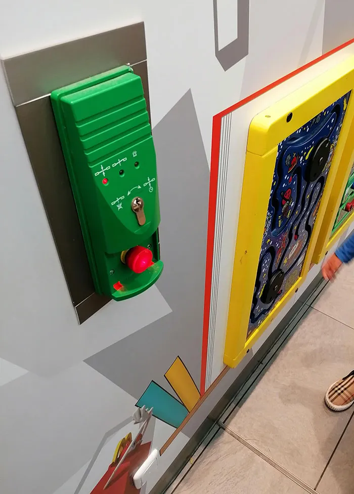 Placing The Emergency Door Button Next To The Children's Play Area