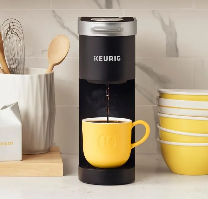 This <a Style="Display:inline;" Href="Https://Www.amazon.com/Keurig-K-Mini-Single-Serve-Coffee/Dp/B07gv2s1gs?th=1&linkcode=ll1&tag=bpgoat-20&linkid=b3676440154f48cb08d9c5d8bd44f82f&language=en_us&ref_=as_li_ss_tl" Target="_blank"><span Style="Font: Inherit; Color: #d74b1f;"> Keurig K-Mini Single Serve Coffee Maker</Span> Is The Compact Caffeine Companion That Will Fit Perfectly Into Your Tiny Apartment (Or Your "I Need Coffee But I Don't Want To Commit To A Full Pot" Lifestyle)