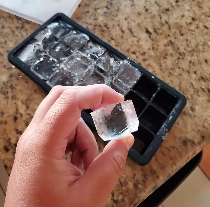 Toss a few ice cubes from your trusty   <a style="display:inline;" href="https://www.amazon.com/glacio-Cube-Trays-Silicone-Lids/dp/B078WFMM4T?crid=2EBV9RMOM8O76&dib=eyJ2IjoiMSJ9.-ASm2BopDjRmdjyxggwHpTtWXjNTB29VML76ITvX4FA13Mgu2iFYI_S9-dcFXmi2hqX2jgCmzGWNLeqHXgYUkbeMEwhic3CSETBeky-YuVc6KgPJe2ax99ifdwqkgy6r0WkPmieG3enlT2Cr97VryVjseQwo2ry1e67J65fk8OSYDQi_moL1sVgsxuJ_gh2svllC0zVKnhK38bhvUaOoniNUTrfTkopCUl5-OImxQbBsq6DmoHXjkCnu9icizTBuWGtxpCAGELVXuWSYYuTPwFsrf5S0X_a0d1kZbuXOBCE.3mq6p0Cgs-QzPo0fH7MqaNBRGuKmbUXJ0DQ64dkI0ho&dib_tag=se&keywords=ice%2Bmold&qid=1723171556&sprefix=ice%2Bmold%2Caps%2C368&sr=8-50&th=1&linkCode=ll1&tag=bpyak-20&linkId=3b753e272768e7638a35703c21806728&language=en_US&ref_=as_li_ss_tl " target="_blank"><span style="font: inherit; color: #d74b1f;">ice cube tray</span> (or a damp washcloth) into the dryer with your wrinkled garments. The melting ice creates steam, smoothing out those pesky wrinkles in just 10 minutes. This trick works wonders on lighter fabrics like shirts and slacks.