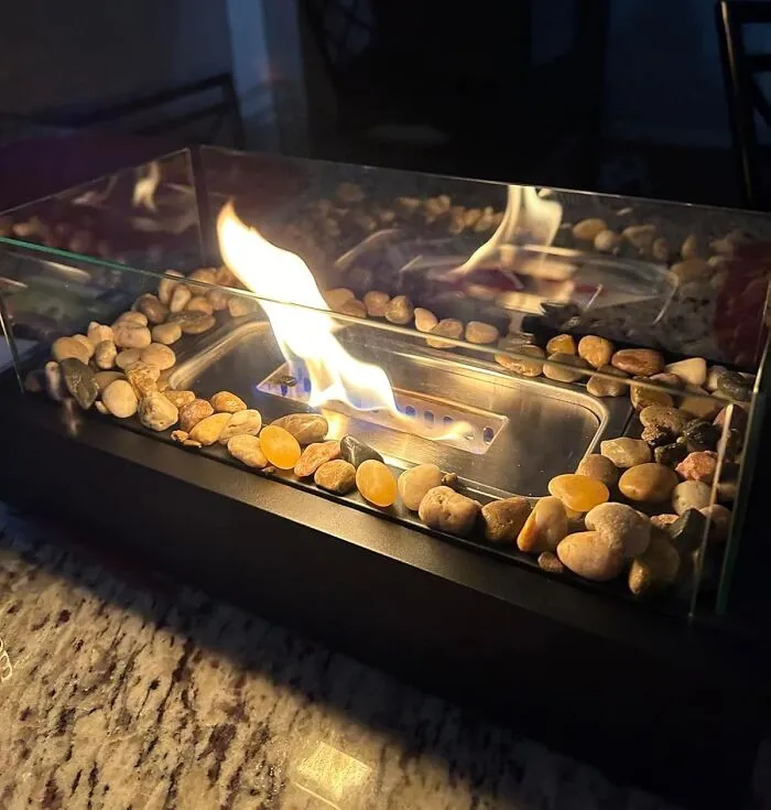 A <a Style="Display:inline;" Href="Https://Www.amazon.com/Tabletop-Portable-Fireplace-Backyard-Housewarming/Dp/B0cdkpm6g6?ie=utf8&linkcode=ll1&tag=bpgoat-20&linkid=400f04ac2b98d719b8fdfce6505e70b8&language=en_us&ref_=as_li_ss_tl" Target="_blank"><span Style="Font: Inherit; Color: #d74b1f;"> Tabletop Fire Pit With S'mores Maker Kit</Span> Is The Cozy Campfire Your Living Room Has Been Craving, Minus The Smoke And Bug Spray