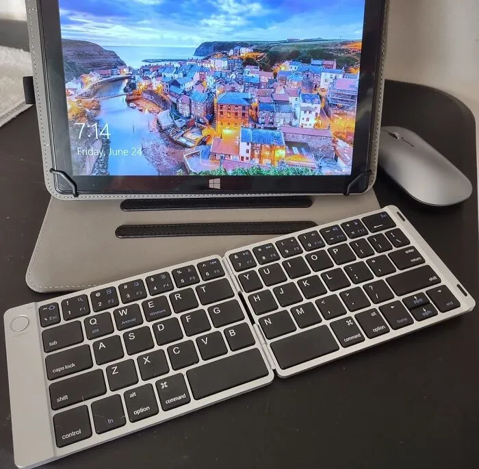 Your Tablet Is About To Become A Productivity Powerhouse With This <a Style="Display:inline;" Href="Https://Www.amazon.com/Dp/B07knhlhdw?asc_item-ID=amzn1.ideas.10rnae513yu6i&th=1&linkcode=ll1&tag=bpstarfish-20&linkid=aea4fa78da08635c8ad8a7246c35e924&language=en_us&ref_=as_li_ss_tl " Target="_blank"><span Style="Font: Inherit; Color: #d74b1f;"> Foldable Bluetooth Keyboard</Span> - Say Hello To Typing Speeds That Would Make A Cheetah Jealous