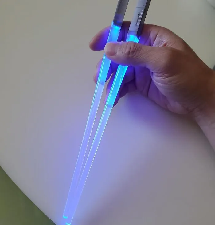 May The Forks Be With You! These <a Style="Display:inline;" Href=" Https://Www.amazon.com/Chop-Sabers-Light-Lightsaber-Chopsticks/Dp/B01ca2hoz4?ie=utf8&linkcode=ll1&tag=bpiguana-20&linkid=b3524871ec83773c5678677dc0ae9637&language=en_us&ref_=as_li_ss_tl" Target="_blank"><span Style="Font: Inherit; Color: #d74b1f;"> Lightsaber Chopsticks</Span> Will Add A Galactic Twist To Your Dinner Table
