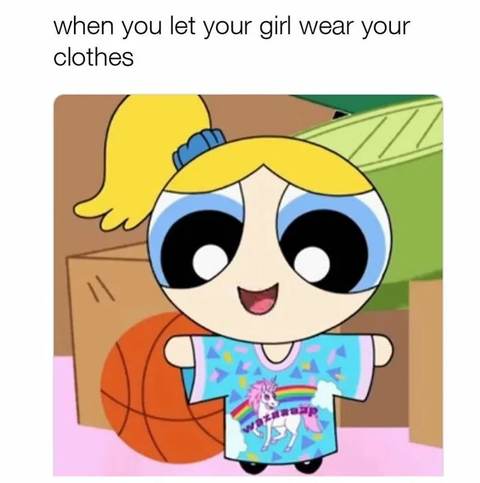 Humorous relationship meme showing girl wearing boyfriend's clothes with cartoon character