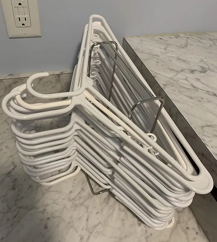Get The Hang Of Your Hangars With This<a Style="Display:inline;" Href="Https://Www.amazon.com/Saiyidanzi-Clothes-Organizer-Stainless-Organizer/Dp/B07flwmwm4?ie=utf8&linkcode=ll1&tag=bporangutan-20&linkid=f14d6f5aadb2fd969f45a5ca48051bd4&language=en_us&ref_=as_li_ss_tl" Target="_blank"> <span Style="Font: Inherit; Color: #d74b1f;">  Stacker</Span> That Prevents A Mountain Of Plastic Tumbling Down Every Time You Open The Closet
