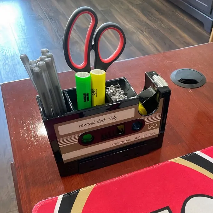 Declutter Your Desk And Unleash Your Inner '80s Kid With This <a Style="Display:inline;" Href="Https://Www.amazon.com/Cassette-Dispenser-Stationery-Container-Gift-Onepalace/Dp/B075rypnqs?dib=eyj2ijoimsj9.u7x99okpdaojmqrvhsztzjrc2vhgo_hfrhjsdx1e5hlhanko6epkqphdudnw2gk4jgqa_kx3jzotkla8pxiaocydufozdrjbmahdbcex9wpzx0uvrxvjs57i4azq95kv8dsnhiwhax-Ugqzf5zsx6zhoxvfjf2p5lnch4qptxxsdrpguljzbooijuneusvnox9md_konn2qywcw12bnkxoi7b34bjf7tcnckdfwfgyyjkaukt1rihyj85w8y-53lwfjhrwh5xpncoo1iiemb-Oyvcthfuwijezmkh1uxhjo.on_7e76zw5zjod12sumsl4s5armgihd8ylksggsveyk&dib_tag=se&keywords=cool%2boffice%2bsupplies&qid=1725880115&sr=8-53&th=1&linkcode=ll1&tag=bpmoose-20&linkid=ef7ad21f3112b1aa2edfb9317806e685&language=en_us&ref_=as_li_ss_tl" Target="_blank"><span Style="Font: Inherit; Color: #d74b1f;"> Cassette Tape Pen Holder Vase</Span>