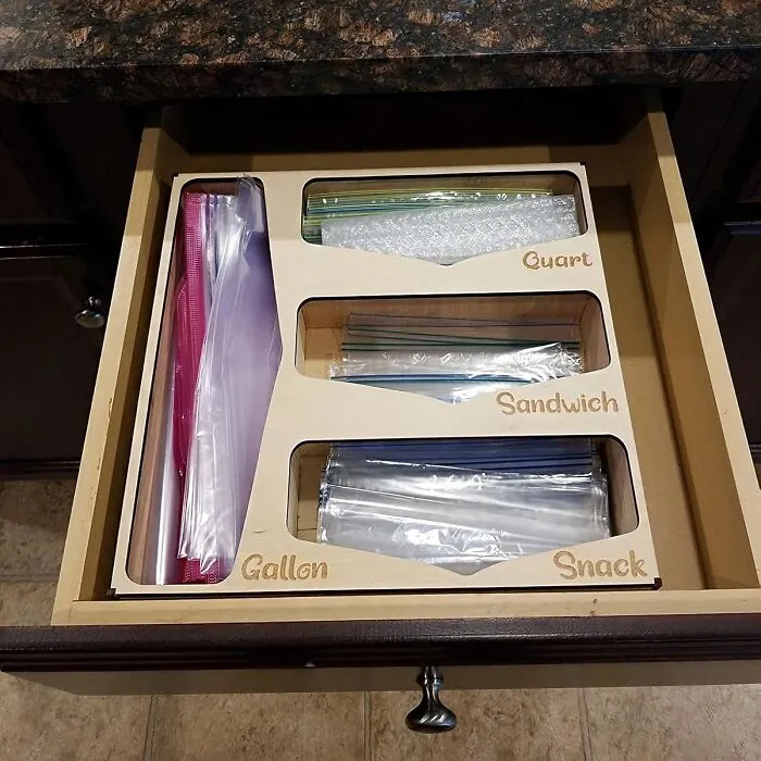 From Sandwich Bags To Gallon-Sized Giants, These   <a Style="Display:inline;" Href="Https://Www.amazon.com/Dp/B095pht4f9?asc_item-ID=amzn1.shoppablemedia.v1.fe637845-C4b3-4346-9704-E9936adb9427&linkcode=ll1&tag=bpowl-20&linkid=61ed9d80fa372ace1e27fa87d91b0e82&language=en_us&ref_=as_li_ss_tl" Target="_blank"><span Style="Font: Inherit; Color: #d74b1f;"> Food Storage Bag Organizers</Span> Will Keep Everything In Its Place