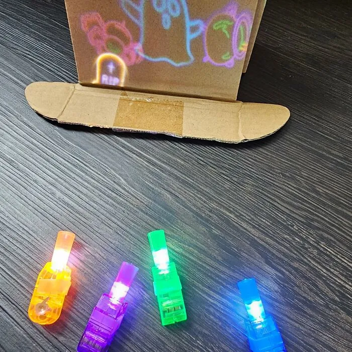 Illuminate Spooky Tales With These Finger-Mounted   <a Style="Display:inline;" Href="Https://Www.amazon.com/Halloween-Fillers-Stuffers-Classroom-Supplies/Dp/B0czddt8rm?content-ID=amzn1.sym.60b0c4ef-0fd2-46d0-8724-84b6f746d062%3aamzn1.sym.60b0c4ef-0fd2-46d0-8724-84b6f746d062&crid=3oulwecny5jtm&cv_ct_cx=halloween+toys+for+trick+or+treat&dib=eyj2ijoimsj9.uaycdcgza0zfm60c_0xbea9urkzb2tn5i1p4gmdlutnkvavtym9aqhvz4kt4gjkqszklbmqvh0lixprj44eqkyi_c_jj7mje3c1xzp1d1ny.uu9z-X3xvqc3j1pknpfw9j9snb3-Pscoi69mu77vl6e&dib_tag=se&keywords=halloween+toys+for+trick+or+treat&pd_rd_i=b0czddt8rm&pd_rd_r=7e687dff-D7a1-4d9b-Ae0b-42c7ead7c859&pd_rd_w=jtkdr&pd_rd_wg=kwqk9&pf_rd_p=60b0c4ef-0fd2-46d0-8724-84b6f746d062&pf_rd_r=9qs1v1t2xxgfd0fg9fhe&qid=1727234717&sbo=rzvfv%2f%2fhxdf%2bo5021pansa%3d%3d&sprefix=halloween+toys+%2caps%2c761&sr=1-50-F853d353-BF33-45e7-B5c2-2cb2b31abc9b-Spons&sp_csd=d2lkz2v0tmftzt1zcf9zzwfyy2hfdghlbwf0awm&psc=1&linkcode=ll1&tag=bprat-20&linkid=7976614debbf6a8eeef5356c7c8ebc1f&language=en_us&ref_=as_li_ss_tl" Target="_blank"><span Style="Font: Inherit; Color: #d74b1f;"> Finger Lights With Halloween Images </Span>
