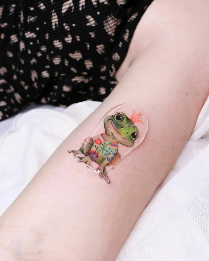 50 Adorable, Creative And Just Awesome Frog Tattoos To Send To Your Favorite Tattoo Artist