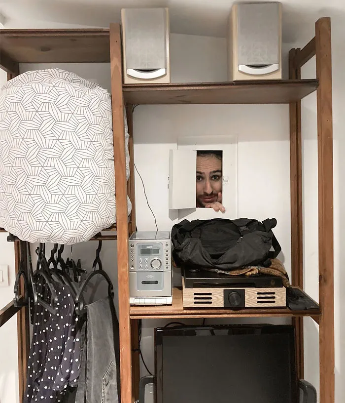 The Airbnb Has A Window From The Shower To The Living Room