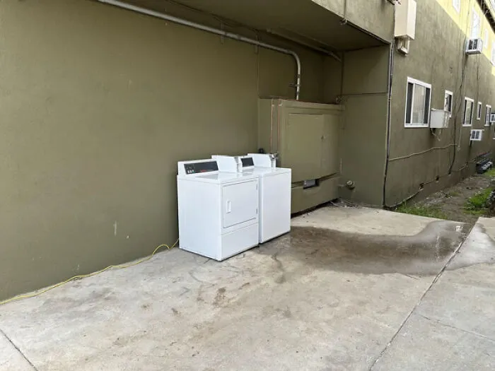 "Landlord is converting the common areas (parking and laundry) into additional units. Introducing the new “open air” laundry room. Powered by an extension cord and water just runs out into the grass" - <span Style="Font:inherit;color:#808080"> fireman137</Span>