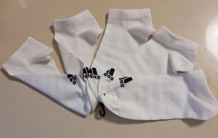Socks Usually Come In Pairs Because People Usually Have 2 Feet, But In This Case The "Usually" Comes Into Play