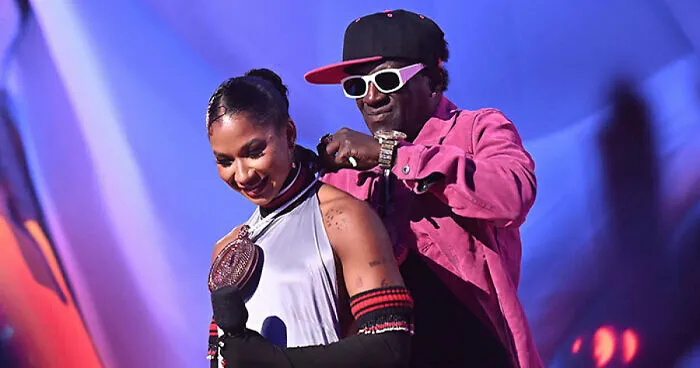 Jordan Chiles Emotional As Flavor Flav Gifts Her A Bronze Clock At VMAs: “You Deserve Everything”